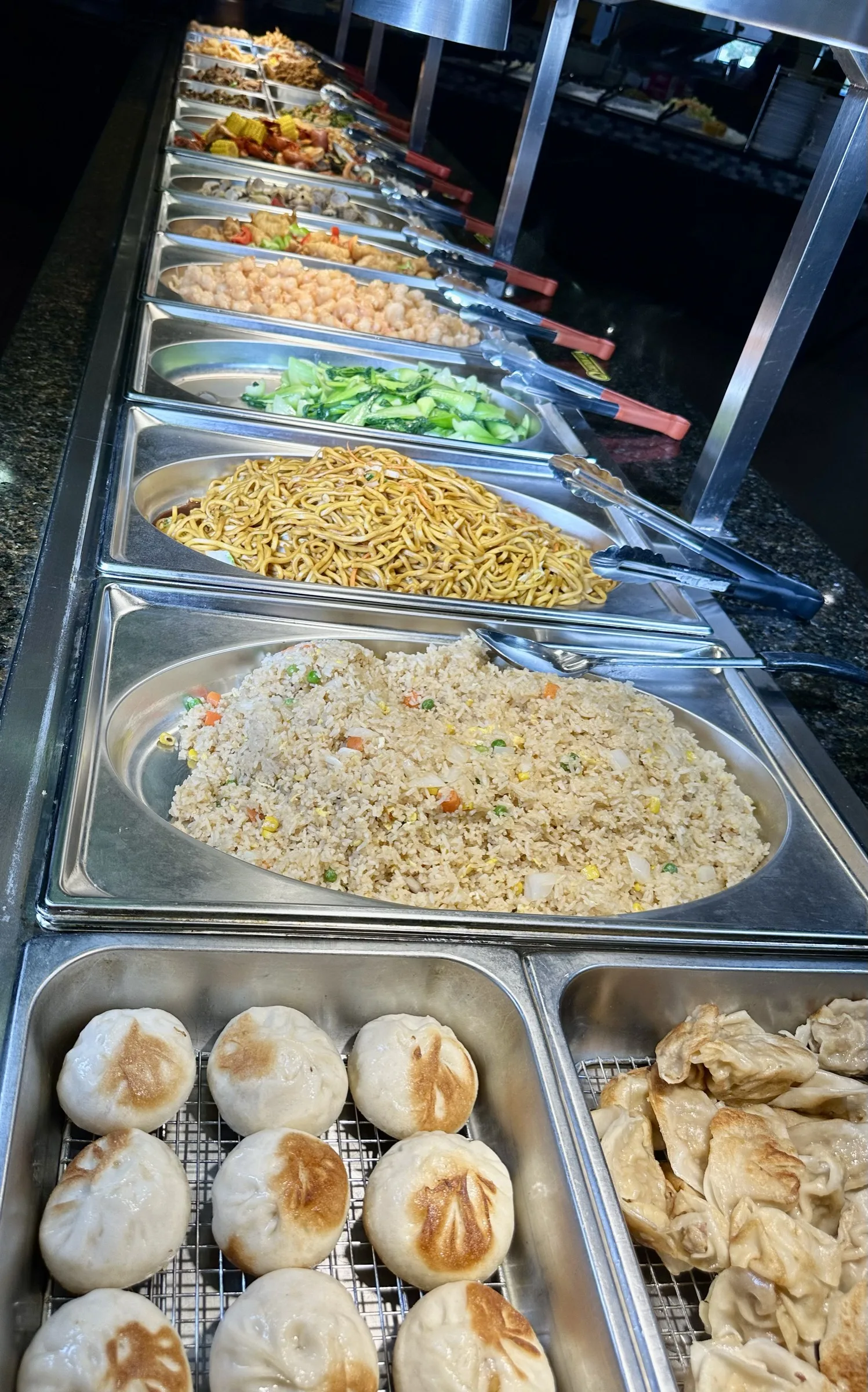 Buffet section with french fries, sesame balls, and chicken skewers at Kumo Ultimate, Stamford CT