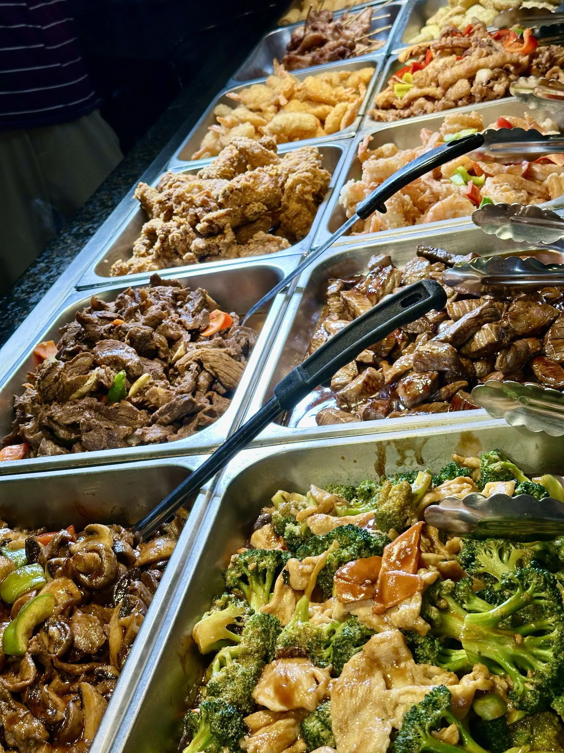 Buffet hot food section with Cajun seafood boil and fried rice in foreground at Kumo Ultimate, Stamford CT