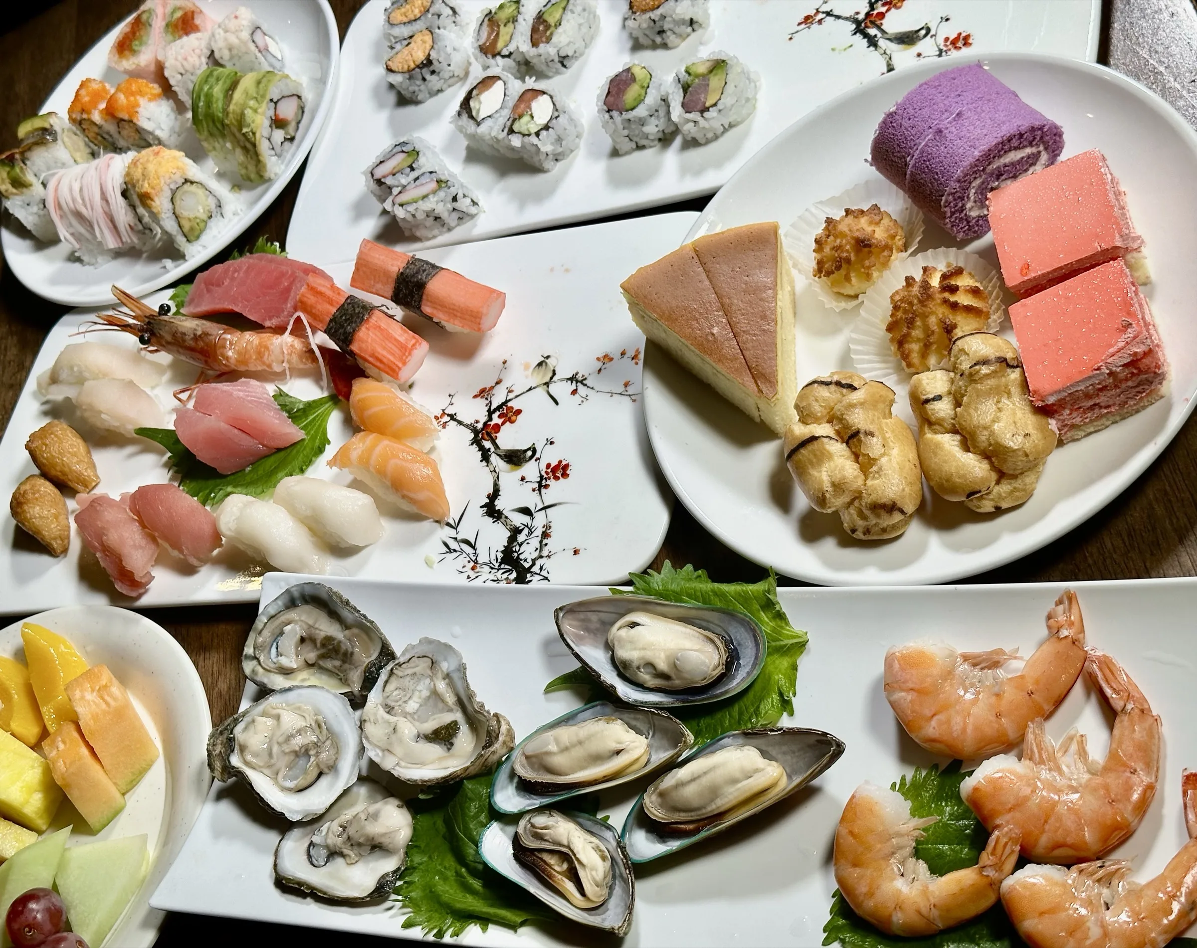 Close-up of sushi rolls, nigiri, half-shell oysters, and mussels at Kumo Ultimate, Stamford CT